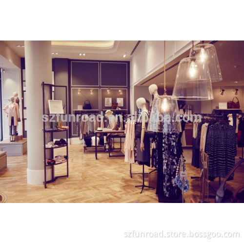 Decorative shoe displays and wall mounted handbag display shelves for brand clothes shop layout